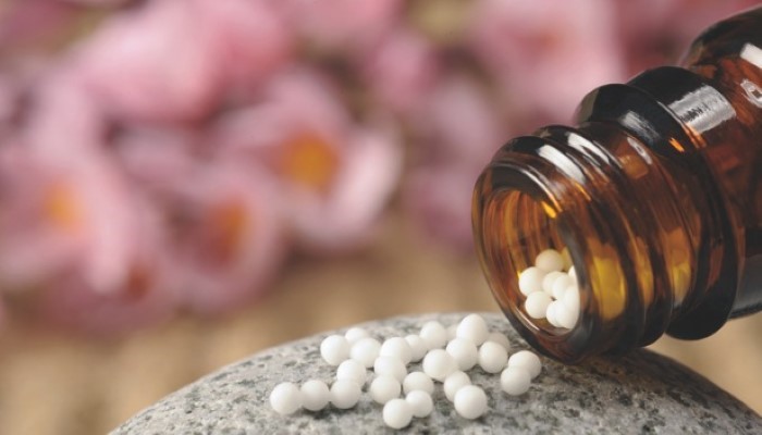 Flacon de médicaments homéopathiques Flacon de médicaments homéopathiques