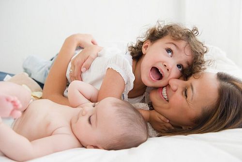 Une maman et ses enfants Une maman et ses enfants